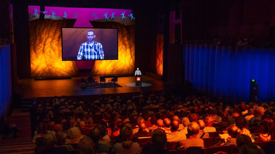 Photo of Seth Stephens Davidowitz giving a keynote speech and the Integrity 20'18 conference.